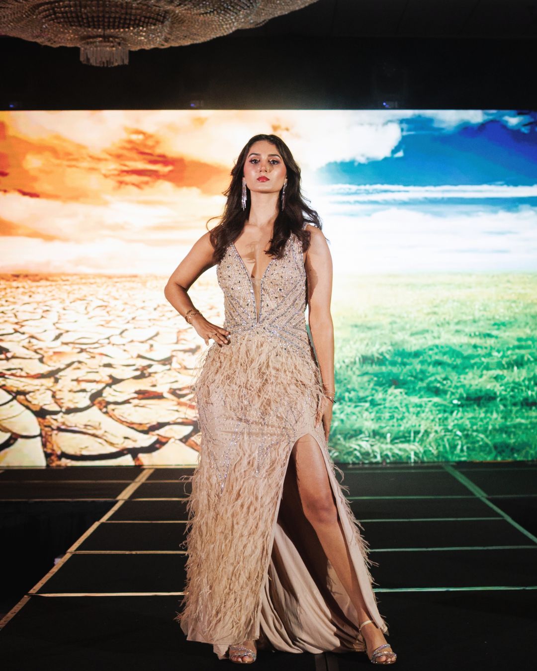 Champagne Feather-Embellished Gown with Plunging Neckline – Luxury Couture by Anjali Phougat